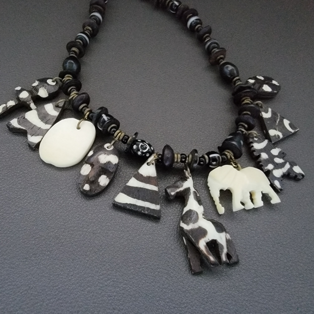 Hand-Carved Bone Animal Charm Necklace Wood Glass Tribal Artisan Statement